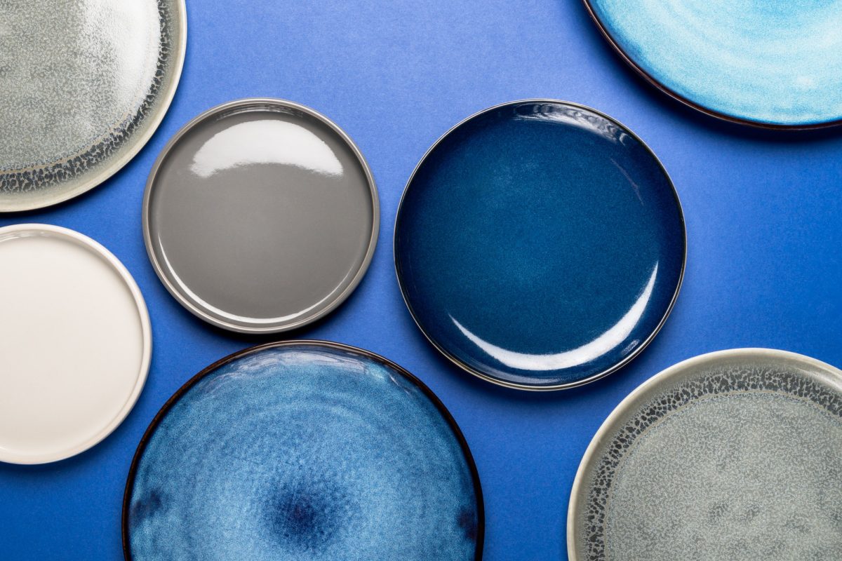 empty-blue-plates-on-grey-background.jpg